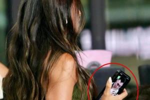 终生难忘！安东内拉被拍到手机壁纸为梅西亲吻大力神杯瞬间